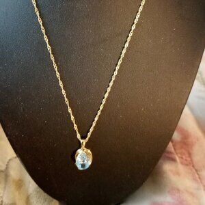 BLUE TOPAZ GOLD OVER SS